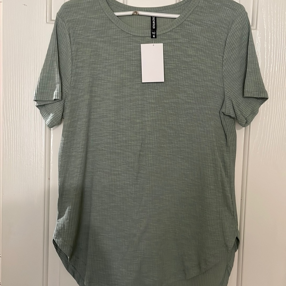 Olive top. Size med. new with tags. Never worn.